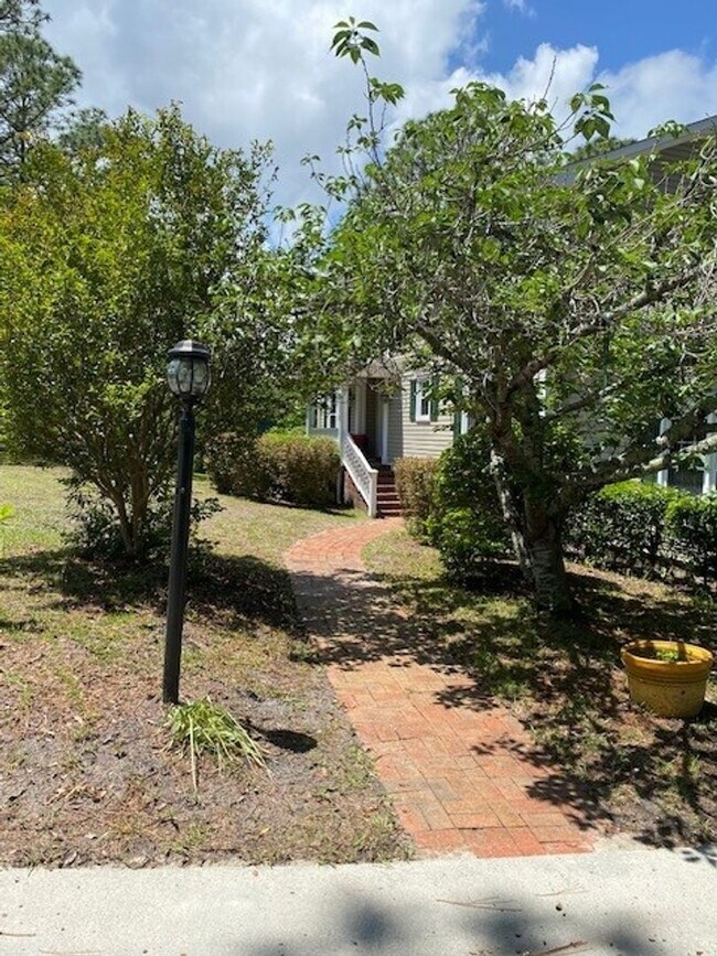 Photo - Welcome to this stunning fully furnished 4 bedroom, 3 bathroom house in the heart of Wilmington, NC.
