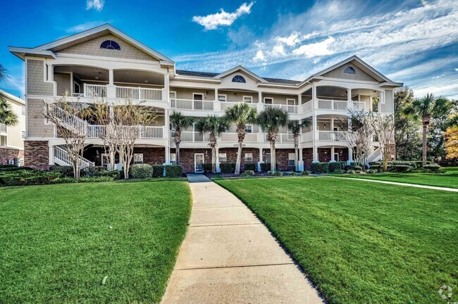 Building Photo - 5801 Oyster Catcher Dr Rental