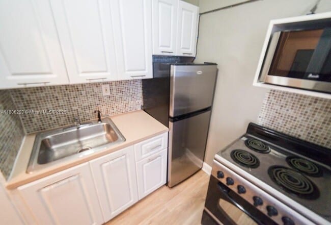 Building Photo - 119 Menores Ave Unit 12