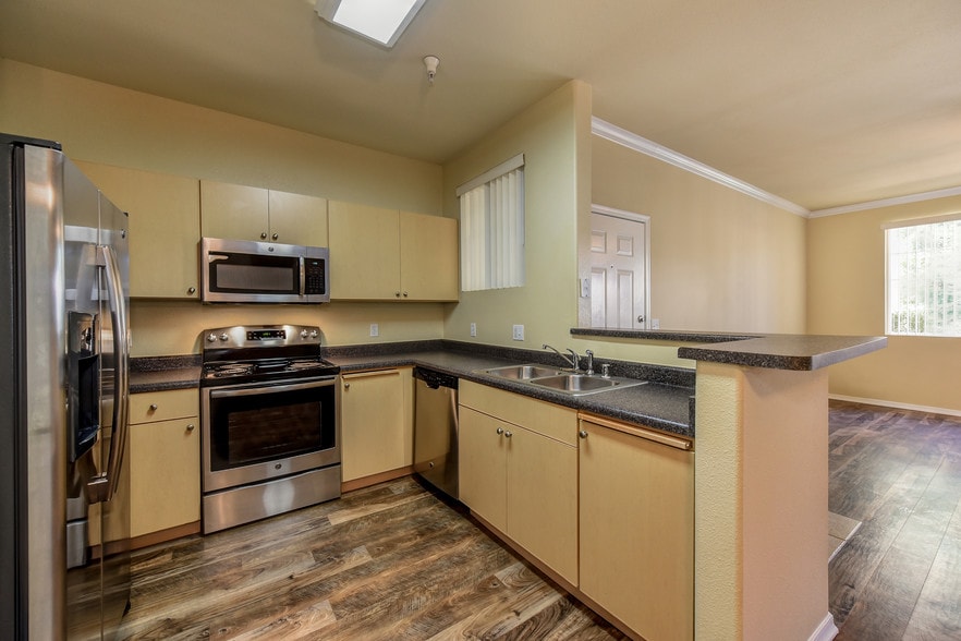Modern Kitchen Interiors w/ Stainless Steel Appliances