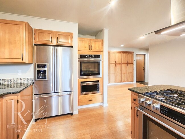 Photo - Modern Elegance Meets Tranquil Lakeside Living On Osprey Circle