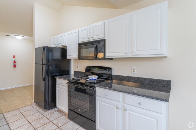 3 BR 2 BA - 1165 Sq Ft - Kitchen - Upland Village Apartments