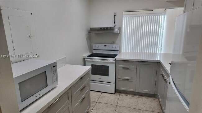 Building Photo - 200 177th Dr Unit 308