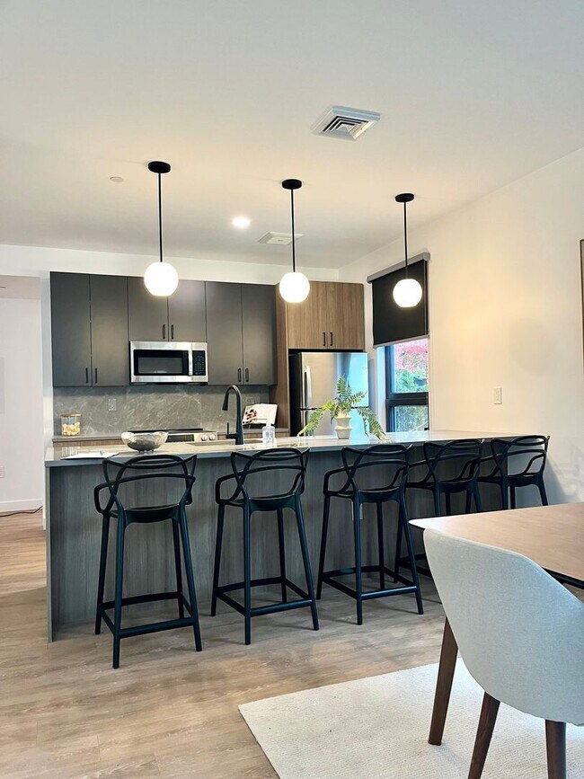 Building Photo - New building with garage parking