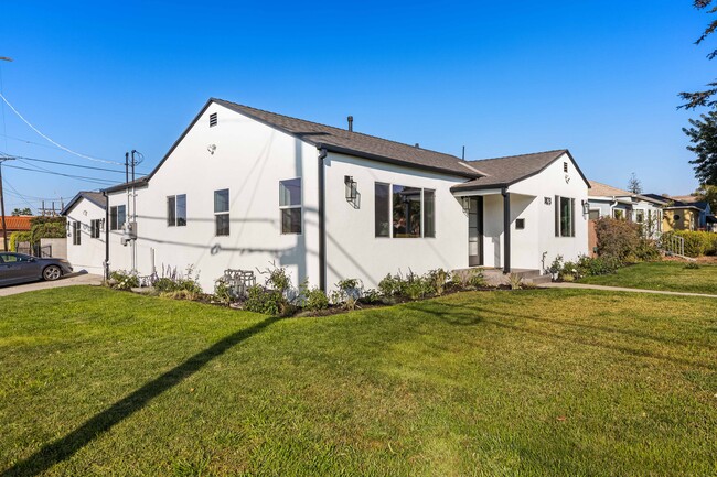 Front and side of the house. Corner unit home with beautiful space that includes dedicated parking.