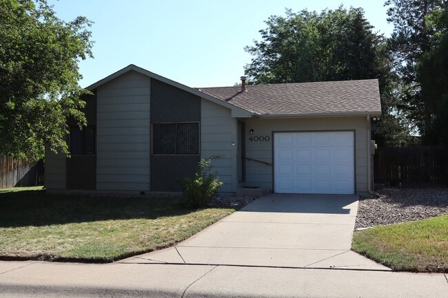 Photo - Charming 2-Bedroom Home with Fenced Yard &...