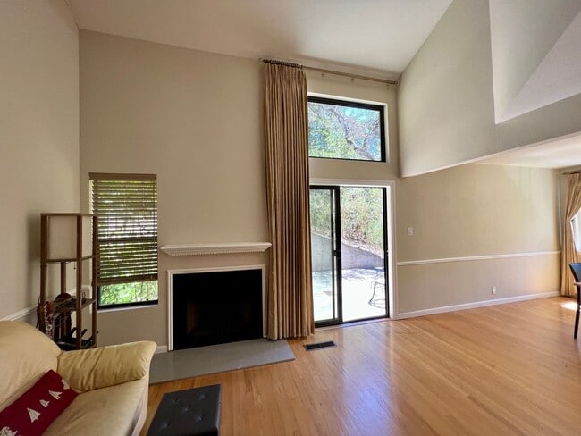 Building Photo - Great Natural light, Treetop Views with 2 Primary Suites plus OFFICE and a 2 car garage, It is li...
