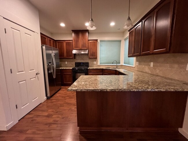 Photo - Stunning 2,588 Sq Ft Residence with Vaulted Primary Suite, Grand Staircase, and Granite Kitchen