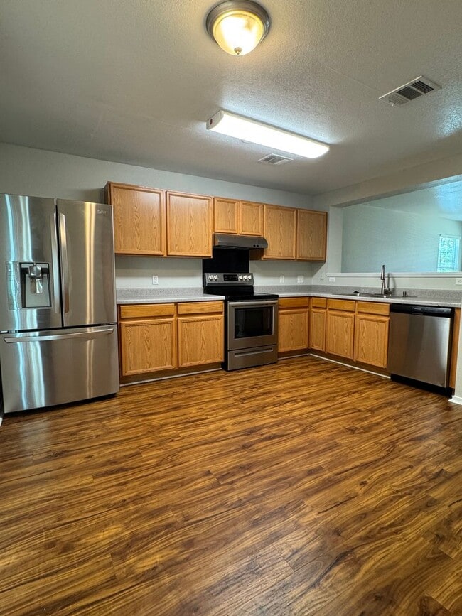 Photo - 3 BR/2.5BA | Single Family Home | 1-Car Garage | Fenced backyard!