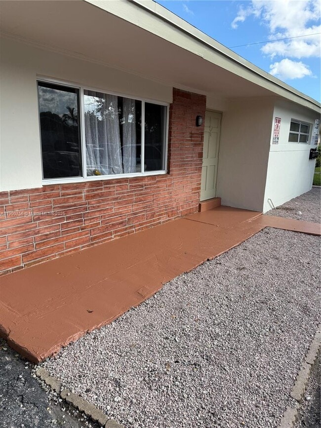 Photo - 1880 NW 59th Wy Unidad 3