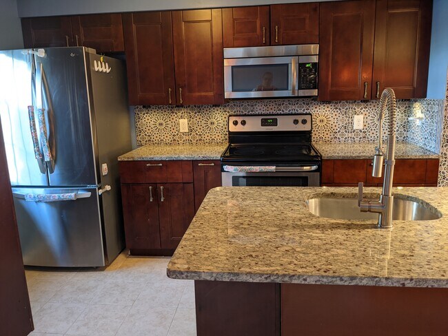 Stainless steel appliances, brand new dishwasher