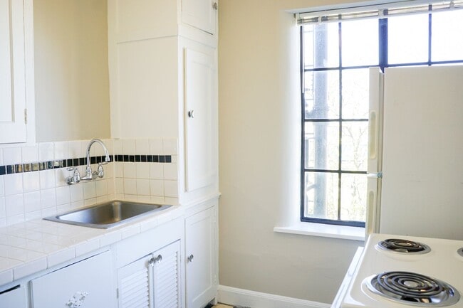 Photo - Top Floor Corner 1 Bed Flooded w/ Natural Light! Unit 506