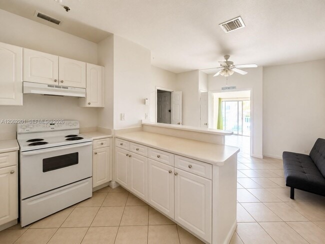 Building Photo - 2734 Bird Ave Unit 203
