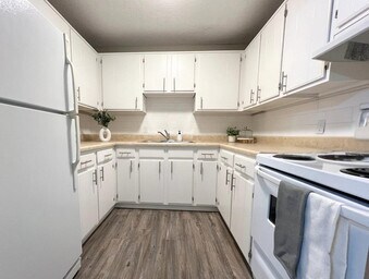 Building Photo - Suncoast Heights Apartments