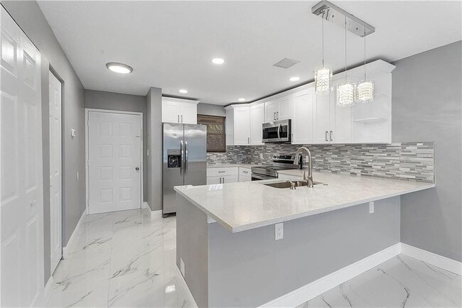 Photo - 11477 NW 39th Ct Unit 305-1