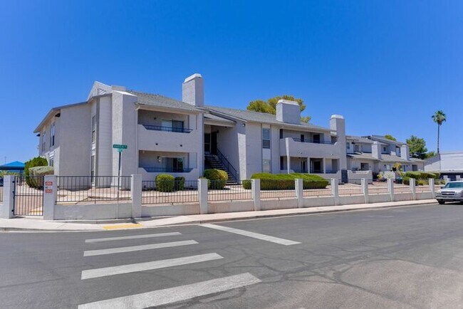 Building Photo - Charming 2 Bed, 2 Bath Condo with Fireplace & Balcony! 89011