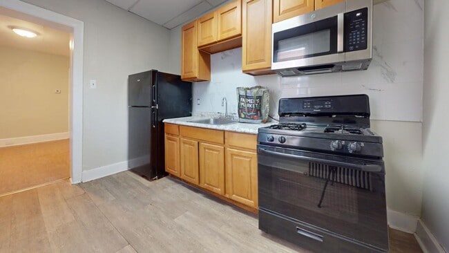 Photo - Contemporary 2 Bedroom Townhome w/ Updated Kitchen & Washer/dryer