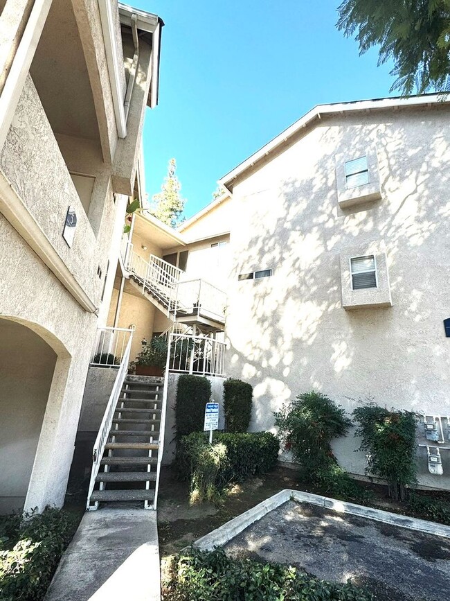 Photo - 2 Bedroom, 2 Bath Upstairs Condo with Private Balcony & 2-Car Garage, Gated Community, Water/Tras... Unit 3