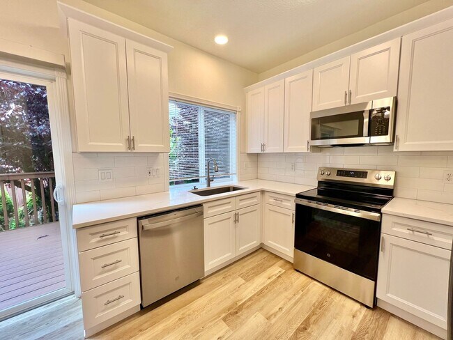 Photo - NEWLY RENOVATED! Spacious 2-Bedroom Townhome in a Charming Cul-de-Sac!