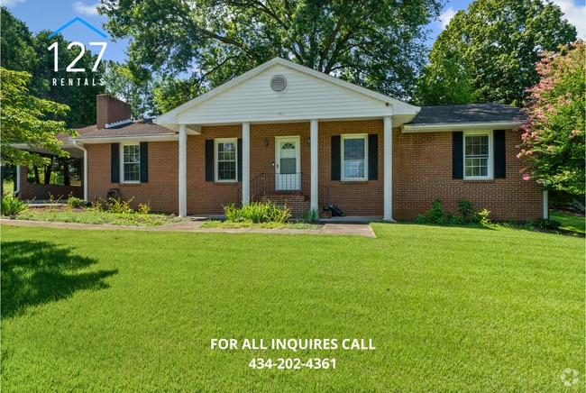 Building Photo - Spacious 4-Bedroom Home with Dual Kitchens...