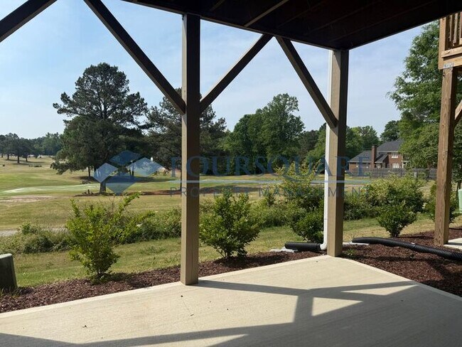 Photo - Scenic 3-Bed Townhome with Screened Porch, First Floor Storage & 1-Car Garage – Overlooking the G...
