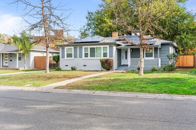 Photo - Charming 3-Bedroom Bungalow with Solar and 2-Car Garage