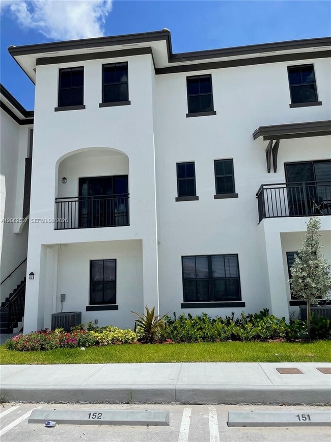 Building Photo - 15560 SW 136th St Unit 207