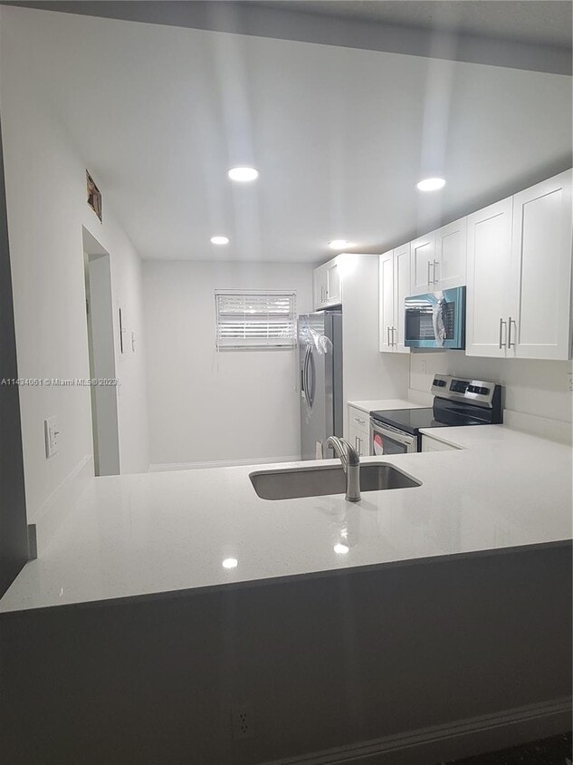 Photo - 1075 Riverside Dr (Coral Springs, FL)