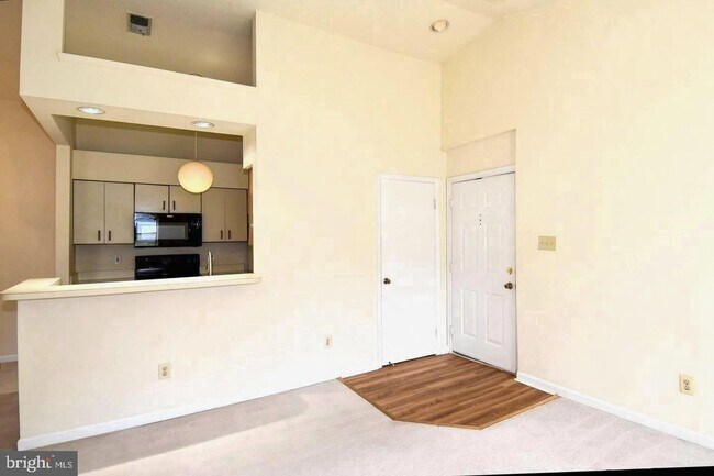 Photo - Sunny and spacious top floor unit featuring an open floor plan perfect for entertaining!