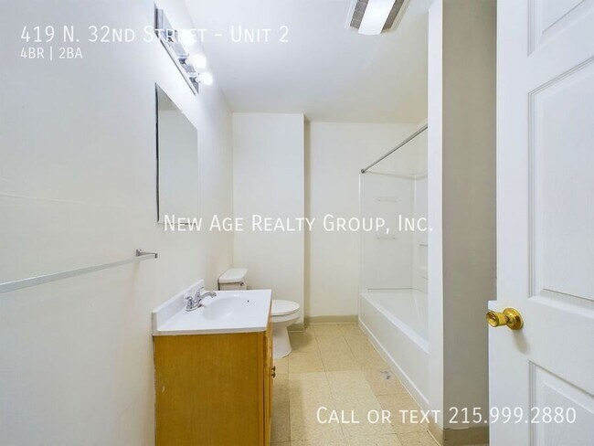 Photo - Spacious, Bi-level Apartment Available at ... Unit 2