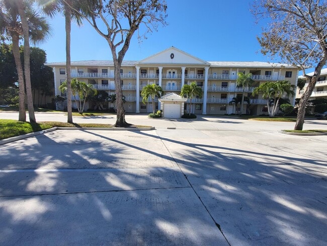 Building Photo - 3511 Village Blvd Unit 403