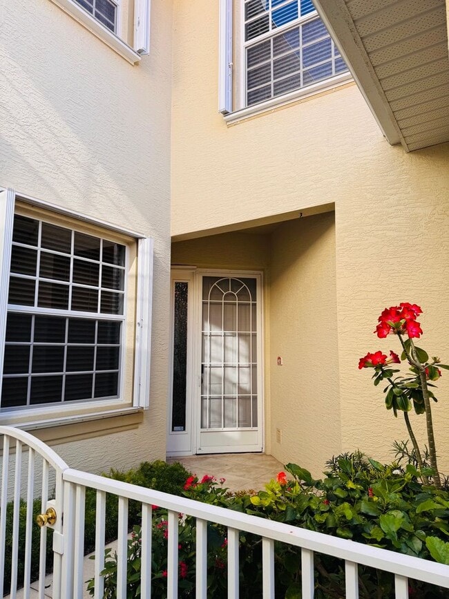Photo - Experience Bell Tower Park. GATED ground floor 2 Bed 2 Bath Den 1 Car Garage Condo.