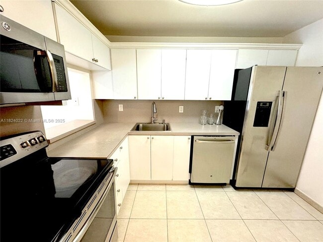 Building Photo - 7900 Camino Cir Unit 305-305 Rental