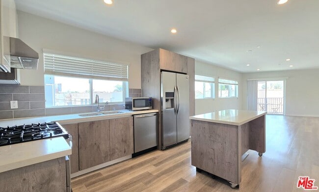 Building Photo - 8532 Cashio St Unit 301 Rental