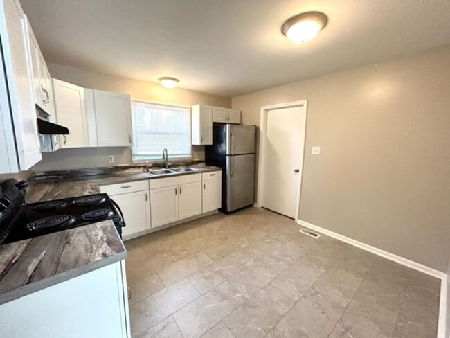 Photo - THREE BEDROOM ONE AND HALF BATH BRICK RANCH HOME