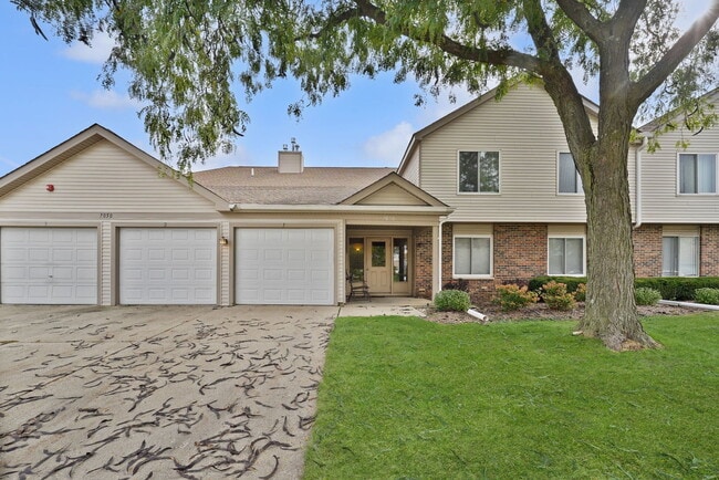Building Photo - 7050 Newport Dr Unit 203