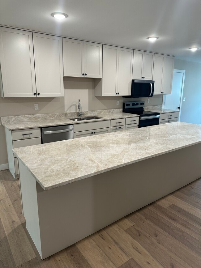 Building Photo - 1504 Lower Trentwood Cir NE Unit 2