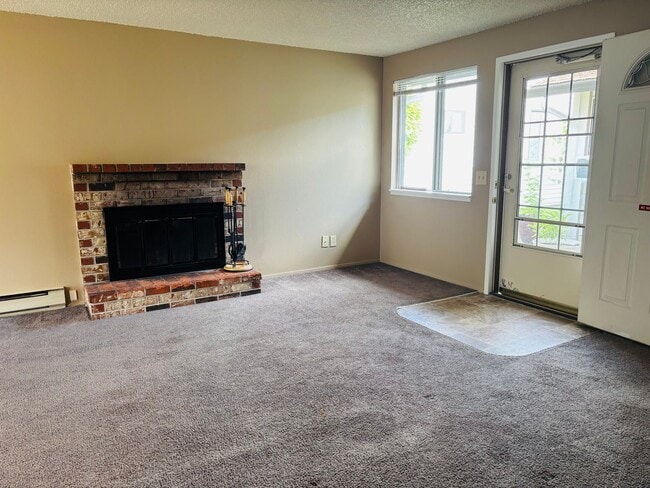Photo - Bright 2 BR Carter Park Living with Fireplace, Carport, and Tons of Storage!