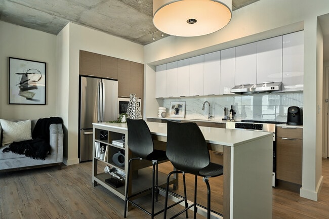 The kitchen of The Piccadilly at Three Light Luxury Apartments