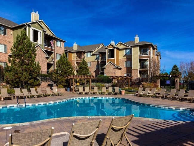 Pool with Sun Deck and Lounge Chairs
