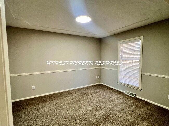 Photo - Spacious 4-Bedroom, 3-Bathroom Home with Fenced Yard and Bonus Spaces!