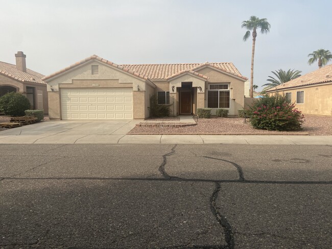 Front of home - 10322 W San Juan Ave Casa