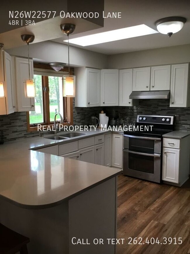Building Photo - N26W22577 Oakwood Ln Rental
