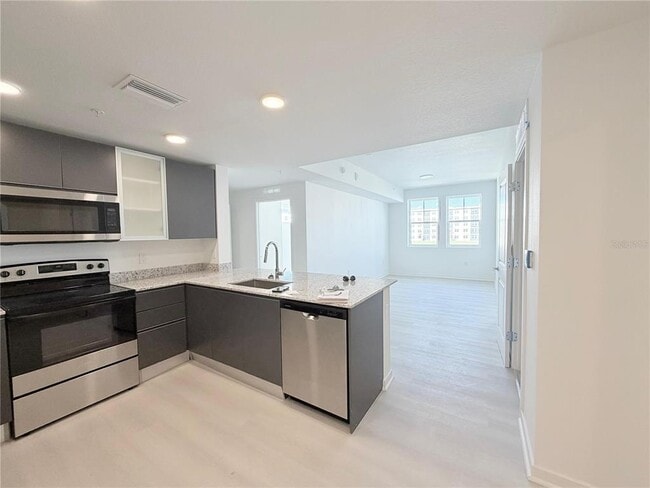 Building Photo - 5587 Millennia Park Dr Unit 221