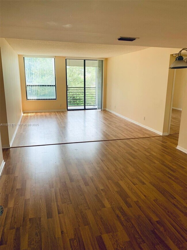 Building Photo - 6301 N University Dr Unit 216