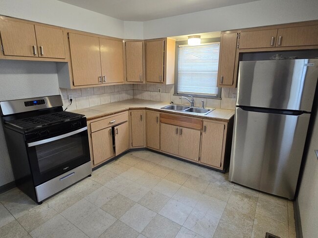 Photo - 5973-75 n 83rd st