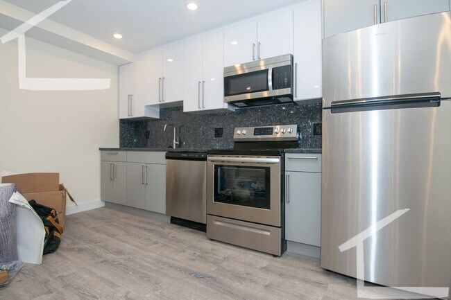 Photo - New Building, In-Unit Washer and Dryer, Central Heat/AC, Elevator, Parking for Rent