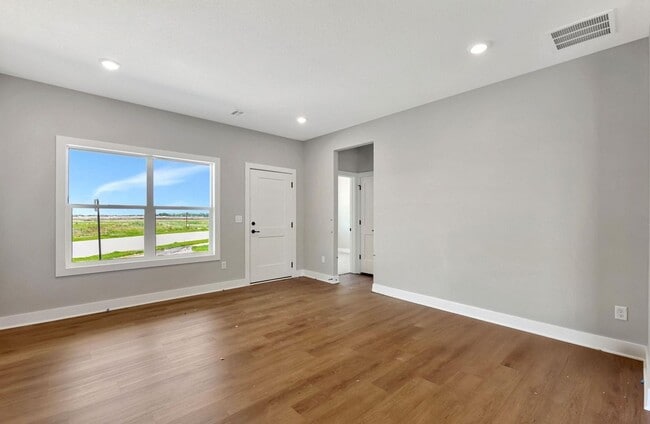 Photo - Modern 3-Bed Ranch in Maize – Zero-Entry L...
