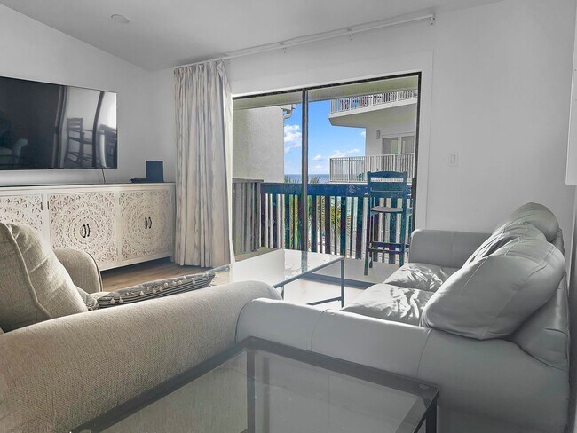 Photo - 50% off first months rent.  Gulf front com...
