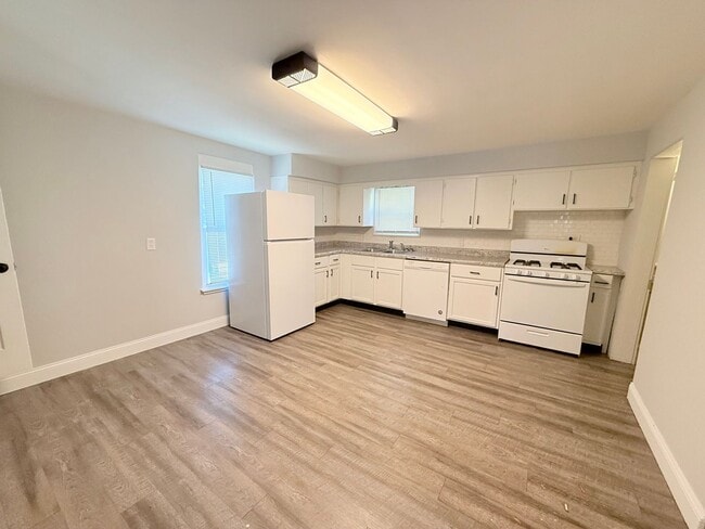 Photo - Spacious 4-Bedroom Home with Fenced Backyard